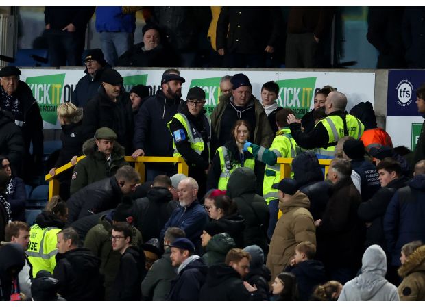 Match between Millwall and Sunderland stopped due to medical emergency, with players exiting the field.