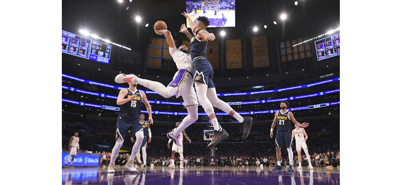 Nuggets' coach Michael Malone sets new wins record, leading team to another victory over Lakers.