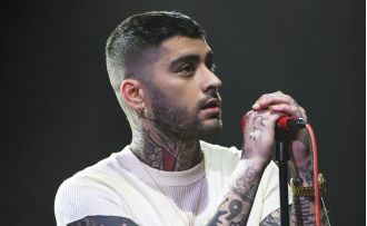 Zayn Malik honors Liam Payne at first tour show following recent funeral.