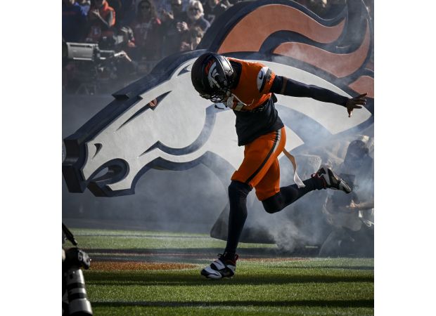 Broncos cornerback Pat Surtain II admires Deion Sanders' Nike Air Diamond Turf cleats for embodying Sanders' identity.