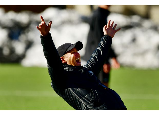 DU men's soccer coach prioritizes player development over short-term success in the transfer portal era.