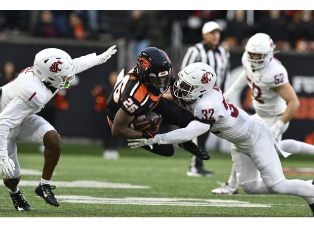 Oregon State breaks losing streak, earns conference title with 41-38 victory against ranked Washington State.