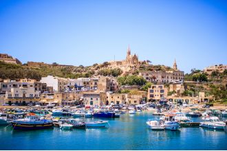 Discover an enchanting island known for its stunning scenery and crystal-clear, warm waters in November.