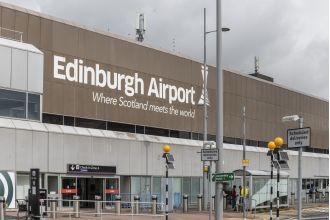 A British Army officer is facing charges for a bomb scare involving a hand grenade at an airport.