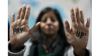 Global leaders agree on $460bn climate deal after close call at summit