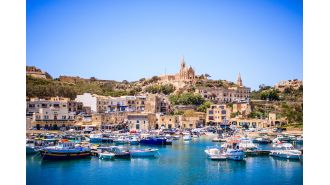 Discover an enchanting island known for its stunning scenery and crystal-clear, warm waters in November.