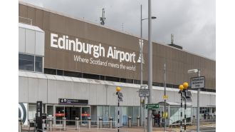 A British Army officer is facing charges for a bomb scare involving a hand grenade at an airport.