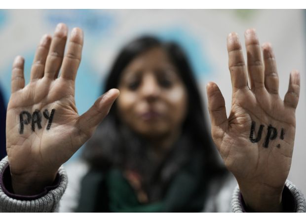 Global leaders agree on $460bn climate deal after close call at summit