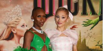 Pop star Ariana Grande shocks social media by holding onto singer Cynthia Erivo's finger.
