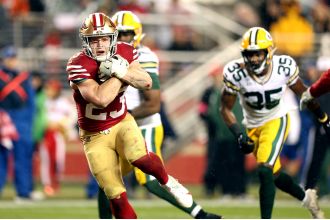 Get the latest updates on the San Francisco 49ers as they face off against the Green Bay Packers in a crucial NFC matchup.