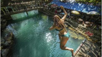 Alcohol poisoning in Laotian backpacker town causes concern.
