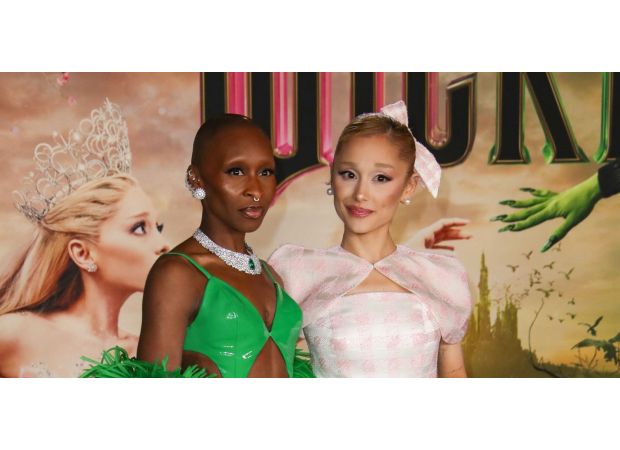 Pop star Ariana Grande shocks social media by holding onto singer Cynthia Erivo's finger.