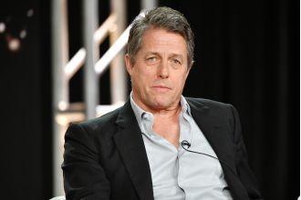 Actor Hugh Grant was spotted getting intimate with a star from Real Housewives during a night of heavy drinking.
