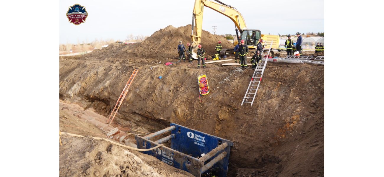 Two employees saved from pit at Centennial building location.