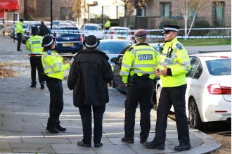 Neighbour tries to save man and 8-year-old girl after they were shot in a car.
