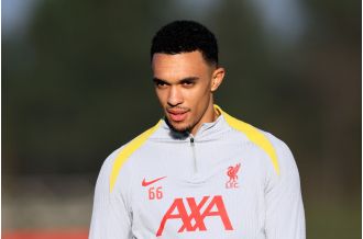 Liverpool player seen at practice before facing Real Madrid.