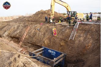 Two employees saved from pit at Centennial building location.