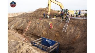 Two employees saved from pit at Centennial building location.