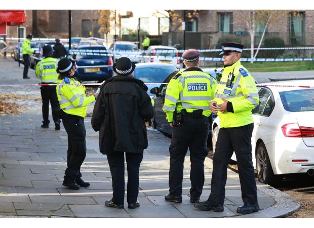 Neighbour tries to save man and 8-year-old girl after they were shot in a car.