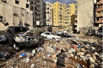 Israel and Hezbollah reach a ceasefire agreement amid airstrikes causing chaos in Beirut.