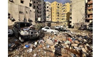 Israel and Hezbollah reach a ceasefire agreement amid airstrikes causing chaos in Beirut.
