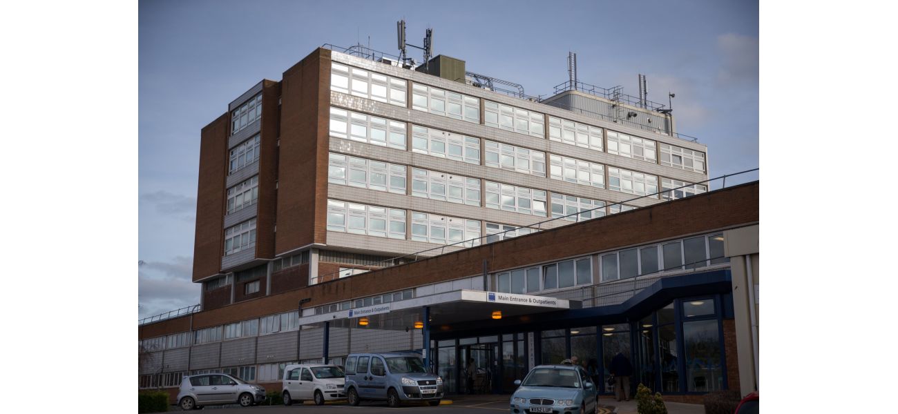 Vehicle slams into hospital, trapping people beneath.