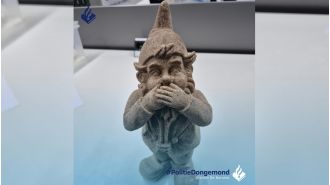 A garden gnome made of MDMA was found during a police raid, surprising the officers.
