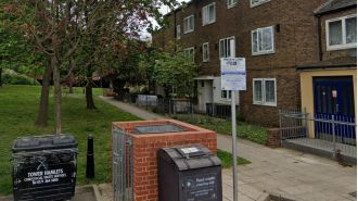 A woman is charged with killing a man and injuring a woman in unexpected stabbing attacks.