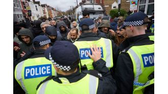 Protests erupt in London as police arrest Kurdish terror suspects, resulting in violent clashes.