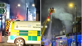In North London, firemen save people from big fire at restaurant.