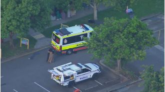 A young child in Brisbane died after being struck by a car near their school.
