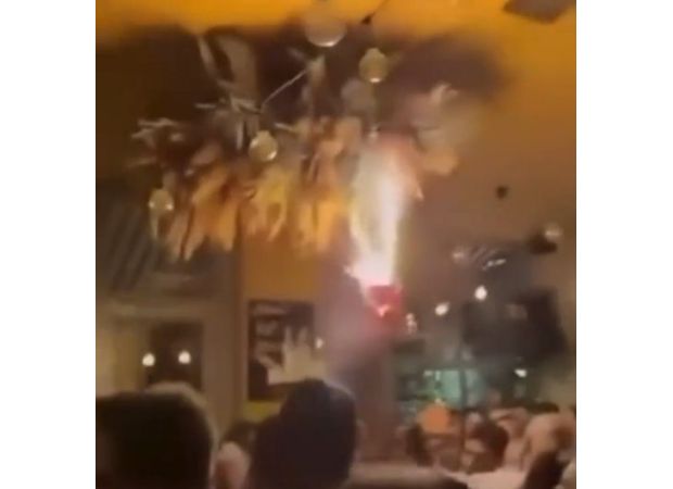 Several individuals injured following a large bar fire caused by birthday cake sparklers.