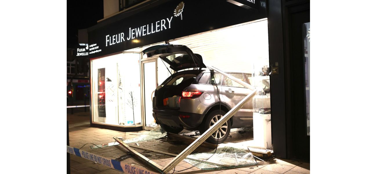 Thieves crash car into store and escape with stolen jewelry.