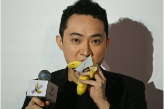 A man eats a £4.88 million banana.