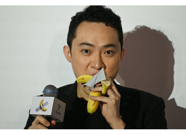 A man eats a £4.88 million banana.