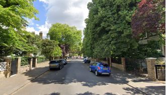 Man spotted carrying gun on posh London street actually had umbrella.