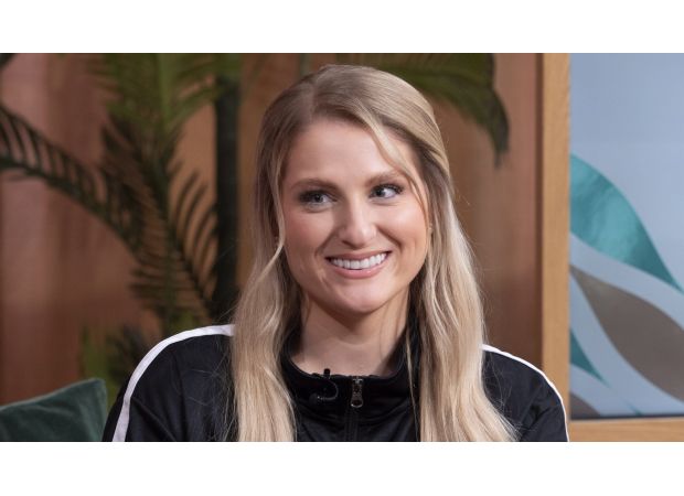 Singer Meghan Trainor says she has permanently lost the ability to smile due to a failed cosmetic surgery.