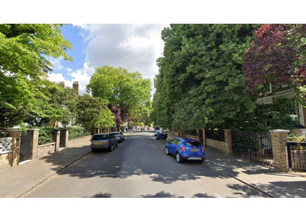 Man spotted carrying gun on posh London street actually had umbrella.