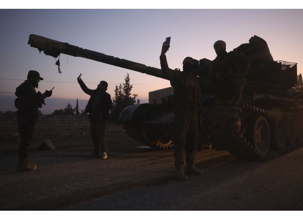 Insurgents break into Syria's biggest city in a surprise attack, marking their first entry since 2016.