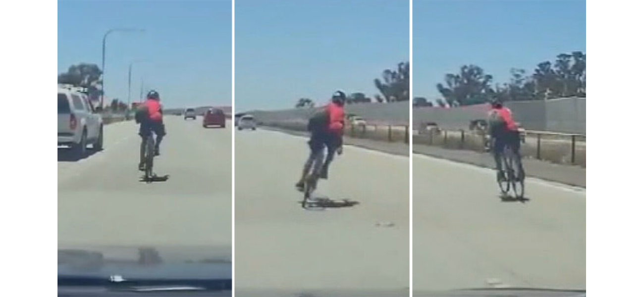 A cyclist was seen riding recklessly on a crowded motorway in Adelaide.