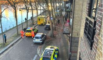 A woman in her 60s was killed by stabbing in her home after neighbors called emergency services.