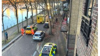 A woman in her 60s was killed by stabbing in her home after neighbors called emergency services.