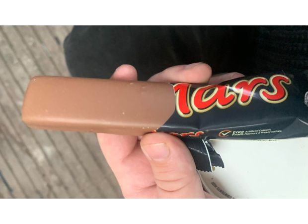 Man finds ruined chocolate bar, receives small amount of money as a consolation.