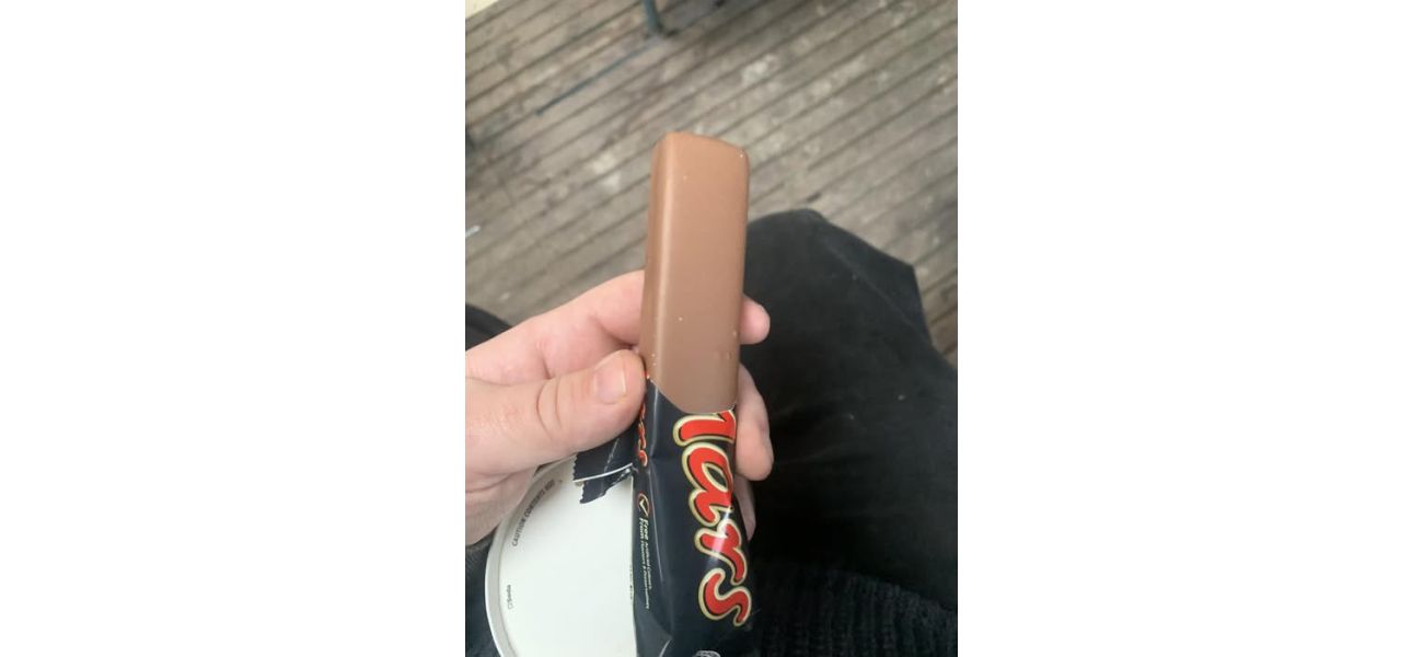 UK man awarded money after opening 'ugly' Mars bar packaging.