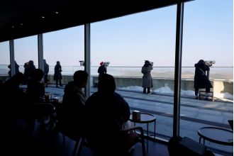 Starbucks has opened a café with a view of a heavily guarded border.