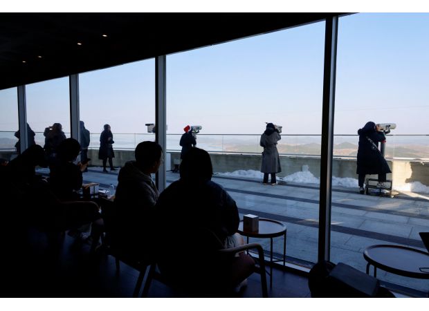 Starbucks has opened a café with a view of a heavily guarded border.