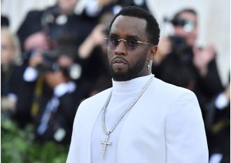 Diddy sued for allegedly hanging woman off balcony, facing $10 million lawsuit.