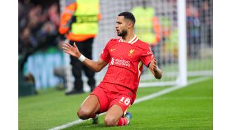 Confirmed starting lineups and predicted team formations for the highly anticipated match between Liverpool and Manchester City, along with any reported injuries.