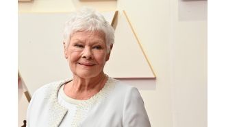 Dame Judi Dench's pet parrot refers to her as a promiscuous woman.