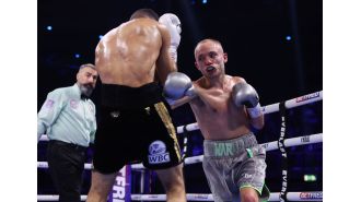 In the midst of a fight, a boxer reveals a surprising truth to their trainer.